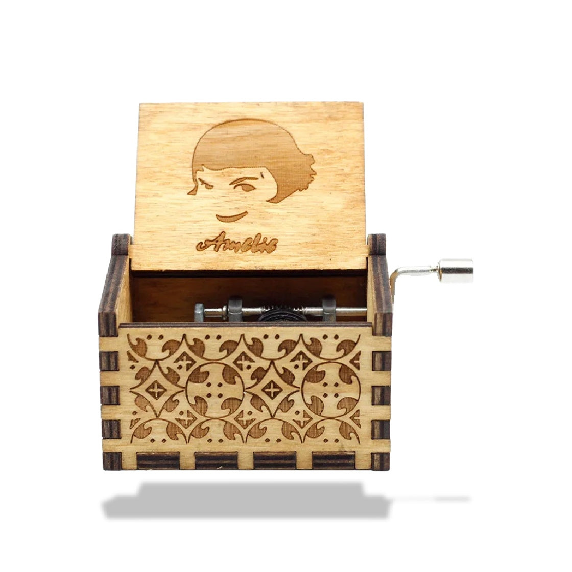 Boîte à musique rectangulaire en bois ouverte, motif floral gravé et visage d'Amélie Poulain sur le couvercle.