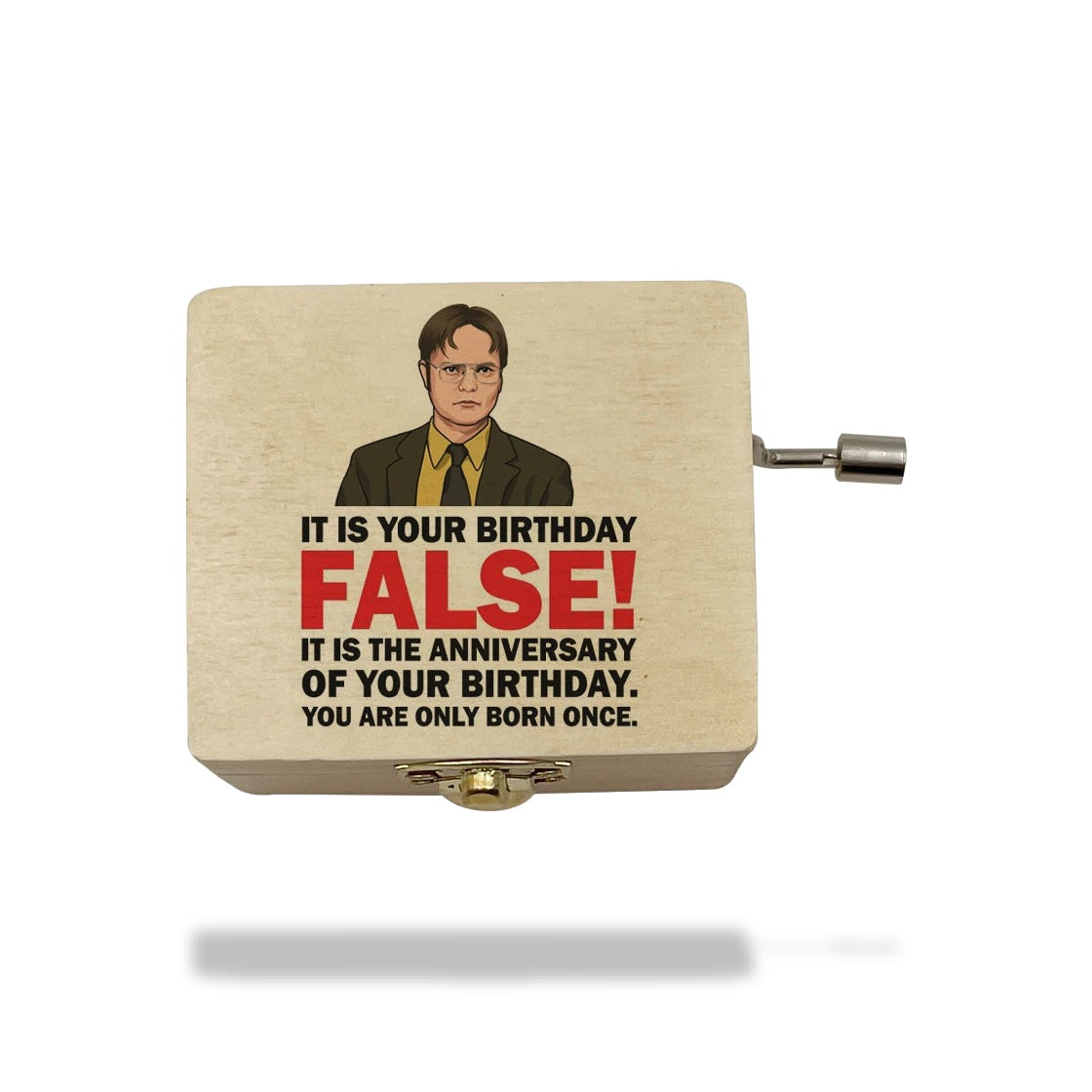Boîte à musique en bois clair avec une illustration de Dwight Schrute et une inscription sur l'anniversaire. Une manivelle en