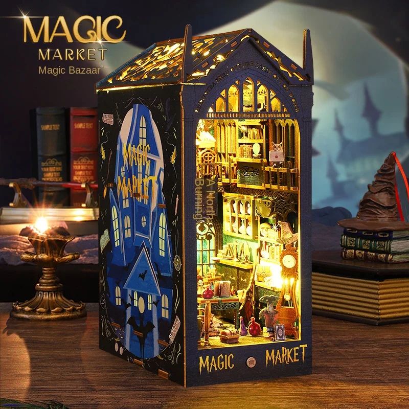 Kit de serre-livres en bois "Magic Market" avec lumières LED, un diorama détaillé d'une rue commerçante miniature.