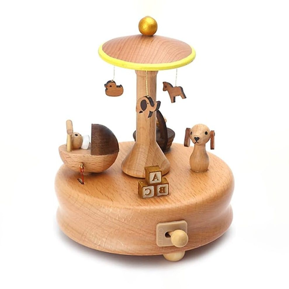 Boîte à musique carrousel enfant en bois de hêtre, avec figurines d'animaux, berceau et cubes ABC.