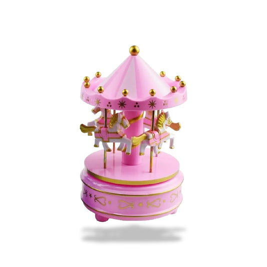 Boîte à musique carrousel rose de 18 cm, avec 4 chevaux blancs et dorés, et détails dorés.