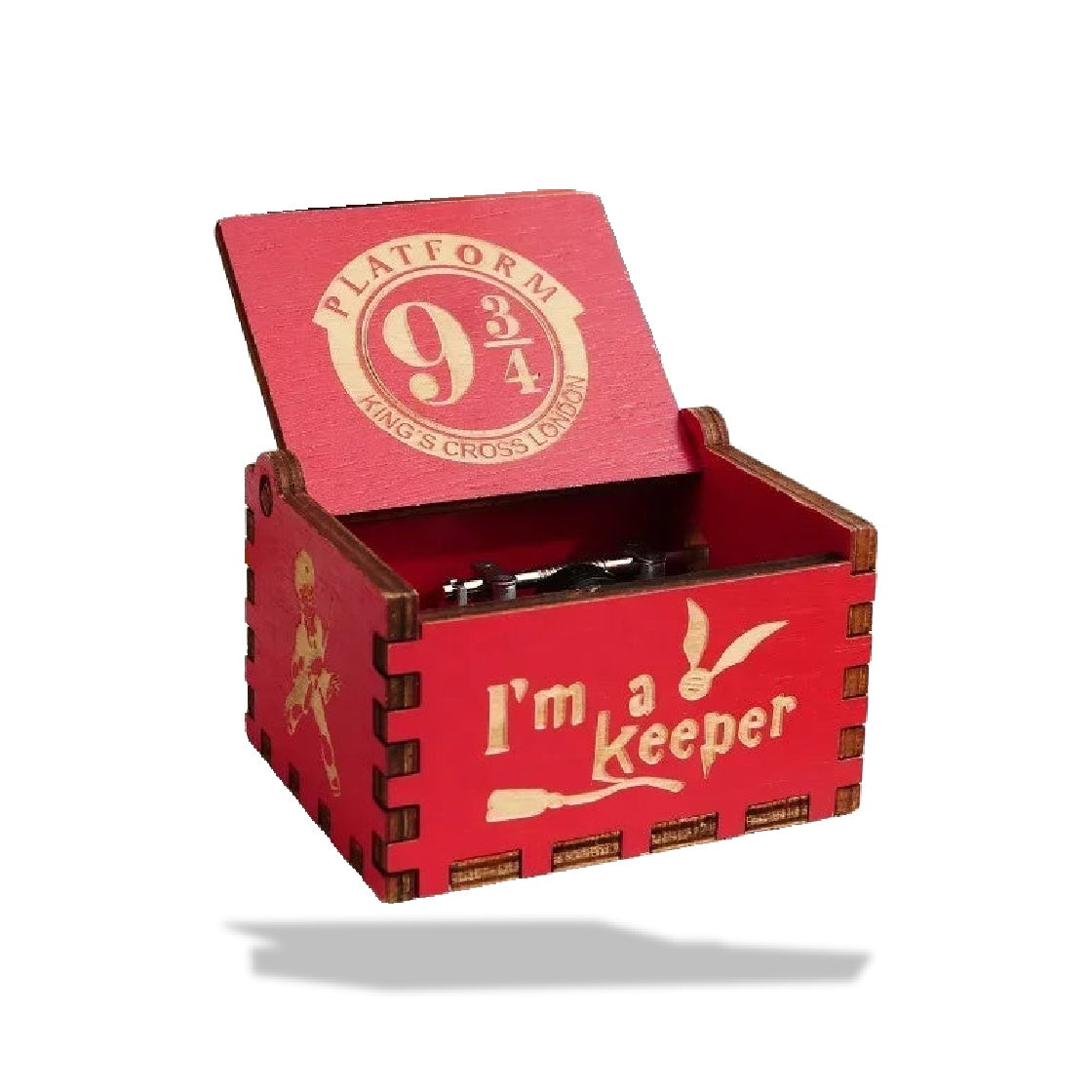 Boîte à musique rouge en bois, couvercle ouvert, avec inscription "Platform 9 3/4" et "I'm a keeper".