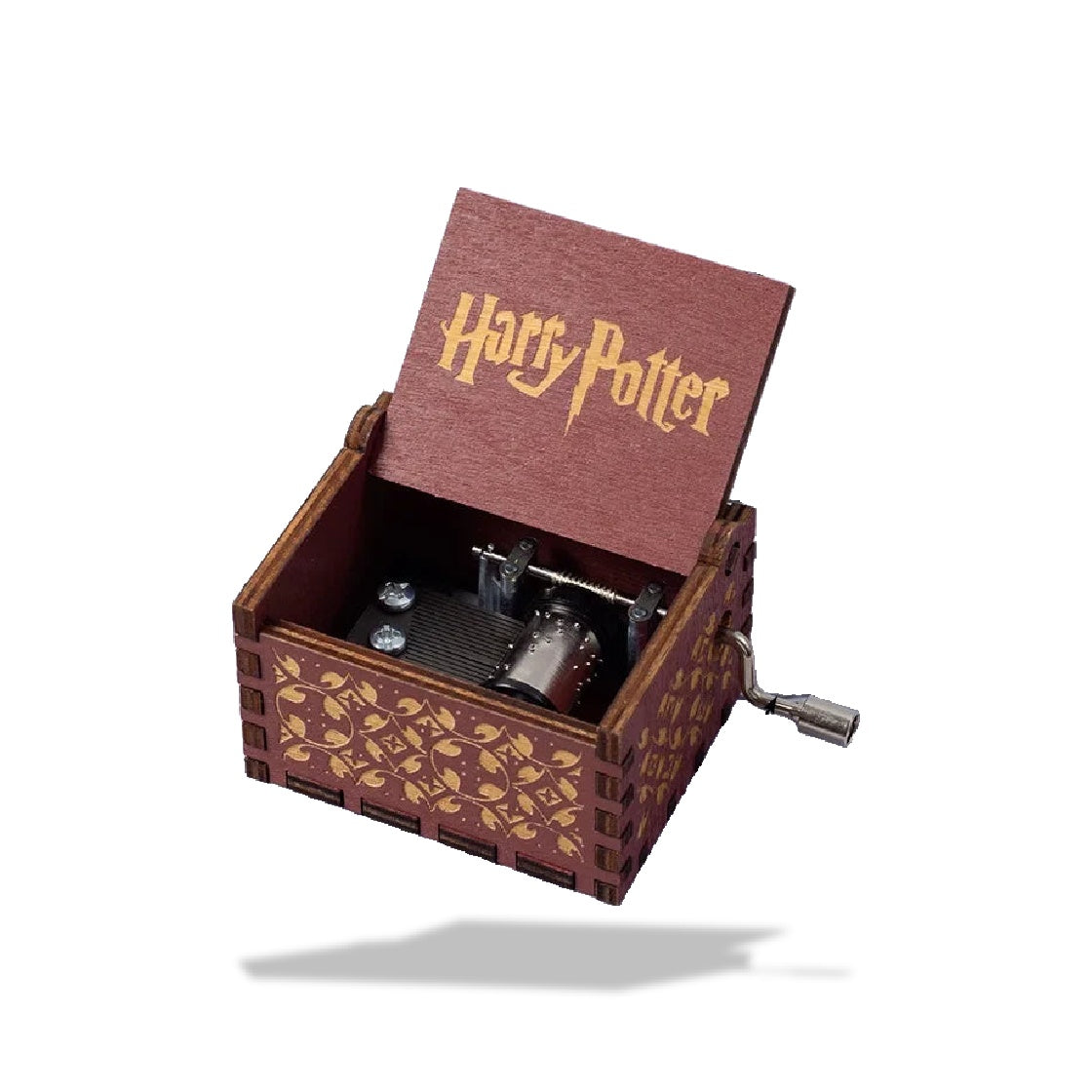 Boîte à musique en bois marron foncé 'Harry Potter', ouverte, avec mécanisme argenté et manivelle sur le côté. Motifs dorés s