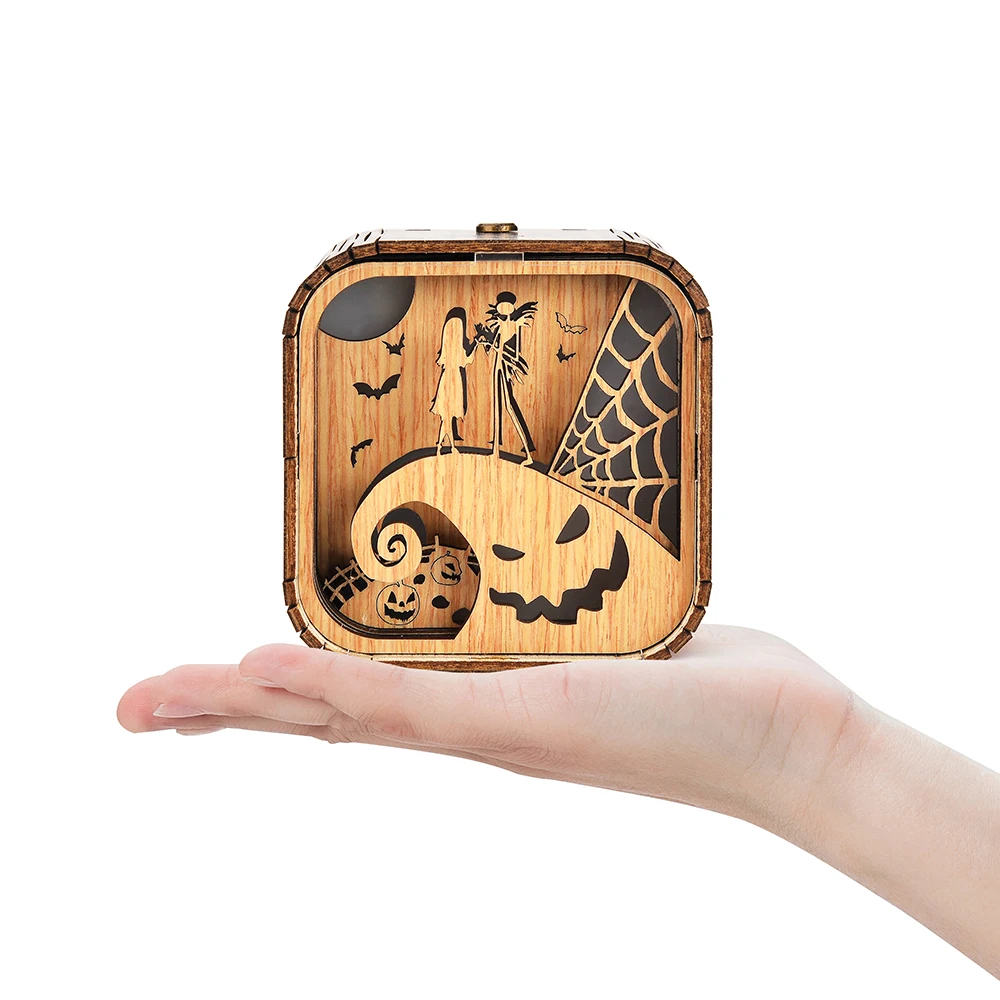 Boîte à musique veilleuse en bois, Jack Skellington et Sally sur citrouille, chauves-souris et toile d'araignée.