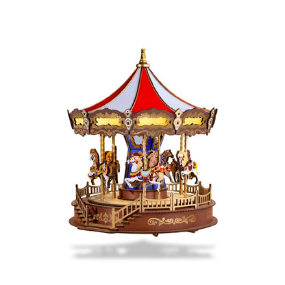 Boîte à musique carrousel en bois à monter. Toit rouge et blanc, chevaux miniatures colorés et base sculptée.