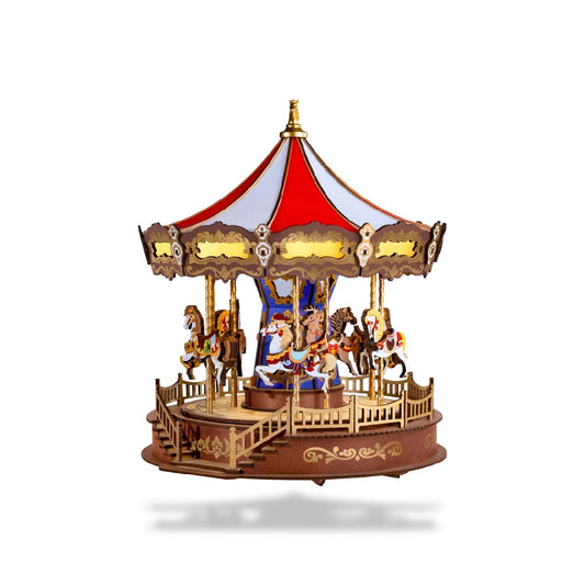 Boîte à musique carrousel en bois à monter. Toit rouge et blanc, chevaux miniatures colorés et base sculptée.