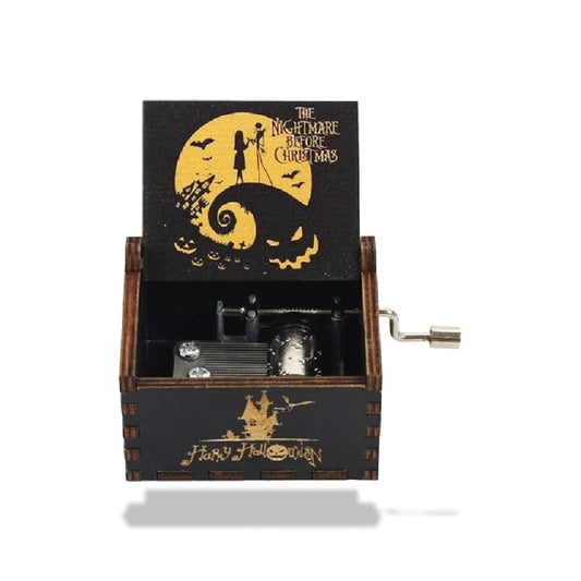 Boîte à musique en bois noire, ouverte, avec motifs Jack Skellington et Sally et inscription dorée.