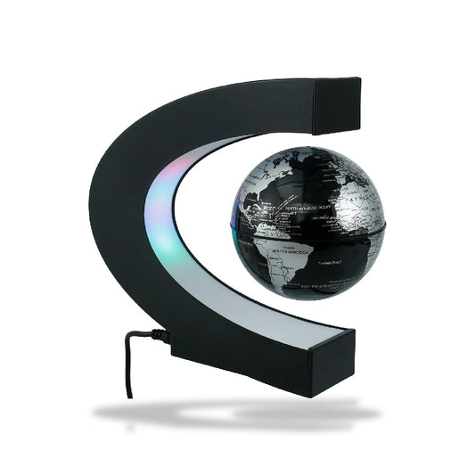 Lampe à lévitation magnétique noire avec globe terrestre flottant noir et blanc. Base en forme de C avec bande LED multicolor